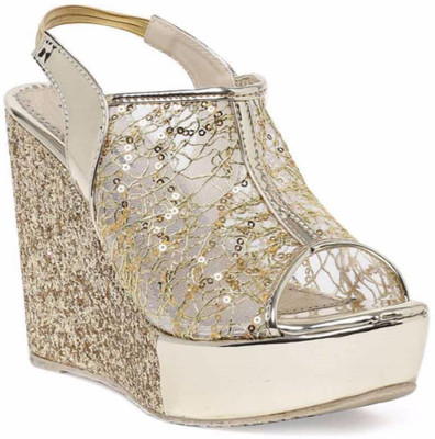 

Stepee Women Gold Wedges