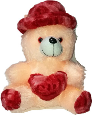 

COST TO COST Soft Peach color teddy with red cap - 12 inch(Peach)