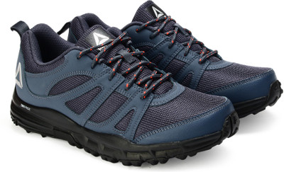 

REEBOK ADVENTURE VOYAGER Running Shoes For Men(Blue, Indigo/cherry/metsil/blk
