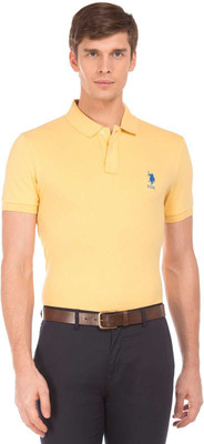 40% OFF on POLO Solid Men Polo Neck Yellow T-Shirt on