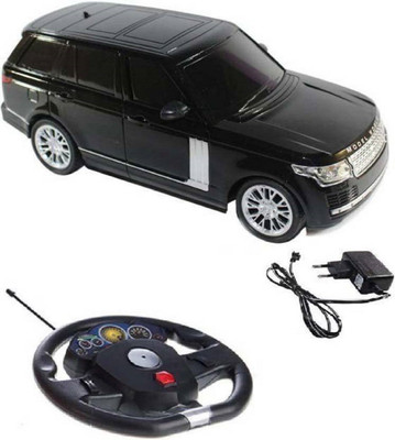 

Amazia Gravity Sensing Steering (1:16 Scale) Range Rover Car With Rechargeable Batteries & Charger Included(Black)