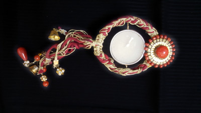 

aakaar21 Designer decorative stone embosed candle holder with candle -red colour-16/18cm Candle(Red, Pack of 1)