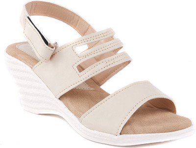 

Dolphin Miles Women Beige Wedges