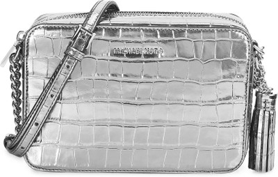 

Michael Kors Women Evening/Party Silver Genuine Leather Sling Bag(Imported)
