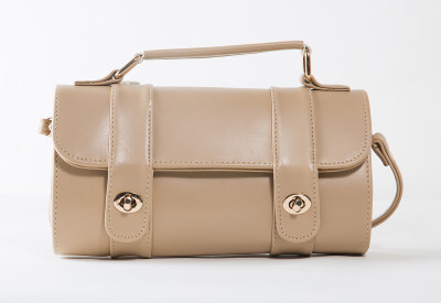 

Thou Art OVAL BEIGE Waterproof Sling Bag(Beige, White, 9 inch)