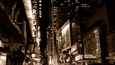 

Aabhaas Wall Poster -cityscape-USA-architecture-New-York-City-street-building-skyscraper-night-street-light-signs-theater-movie-poster-theaters-sepia Paper Print(12 inch X 18 inch, Rolled)