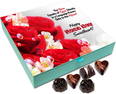 

Chocholik Rose Day Gift Box - The Rose Speaks Of Love Silently In A Language Known Only To Heart Chocolate Box - 9pc Truffles(108 g)