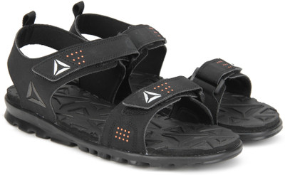 

REEBOK Men BLACK/BRIGHT LAVA Sports Sandals