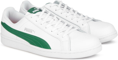 white and green puma shoes