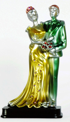

Sigaram Love couple Statue Romantic Decorative Handicraft Figurine Home Interior Bedroom Décor. Decorative Showpiece - 18 cm(Polyresin, Multicolor)