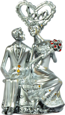 

Sigaram Love couple Statue Romantic Decorative Handicraft Figurine Home Interior Bedroom Décor. Decorative Showpiece - 15 cm(Polyresin, Multicolor)