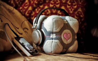 

Akhuratha -companion-cube-headphones-music-portal Wall Poster Paper Print(12 inch X 18 inch, Rolled)