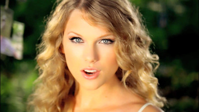 

Akhuratha taylor-swift-video-captures-screen-title-spots-image-photos Wall Poster Paper Print(12 inch X 18 inch, Rolled)