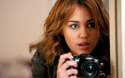 

Akhuratha miley-cyrus-freemusic-camera-pictures-originals Wall Poster Paper Print(12 inch X 18 inch, Rolled)