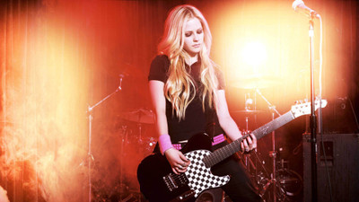 

avril-guitars-celebrities-music Wall Poster Paper Print(12 inch X 18 inch, Rolled)