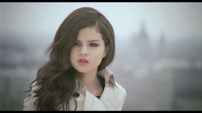 

selena-gomez-round-video-music-title-spots-image-photos Wall Poster Paper Print(12 inch X 18 inch, Rolled)