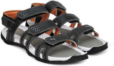 

Puma Men black-limestone gray-orange Sports Sandals