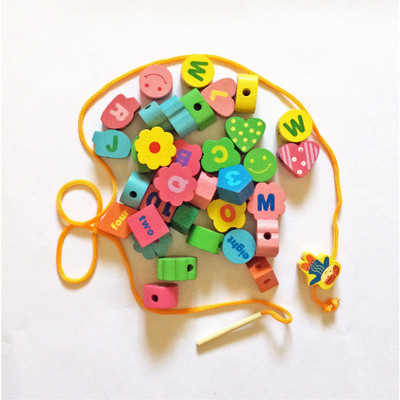 

Babysid Collections Wooden Play Set for Kids Alphabets Numbers Shapes and Colors with Connecting Rope 36 Pcs Set(36 Pieces)