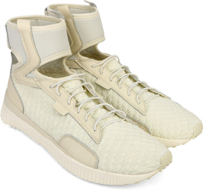 

Puma FentyTrainerMidGeoVanillaIce-Sterli Tranning & GYM Shoe For Women(Beige, Vanilla ice-sterling blue