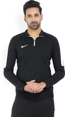 Buy NIKE Solid Men Polo Neck Black T-Shirt on Flipkart