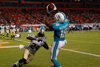 

Sports Miami Dolphins Football Wall Poster Paper Print(12 inch X 18 inch, Rolled)