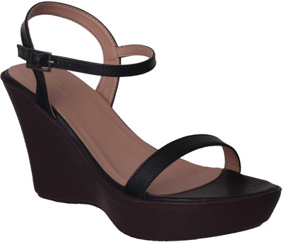 

Flora Women Black Wedges