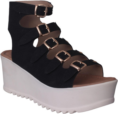 

Flora Women Black Wedges