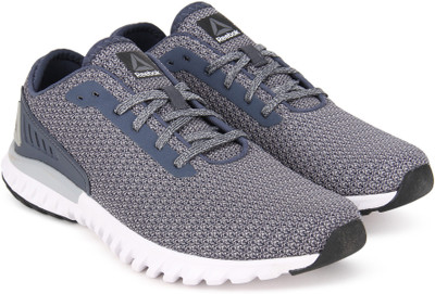 

REEBOK WAVE RIDE Running Shoes For Men(Multicolor, Indigo/grey/slv/blk/wht