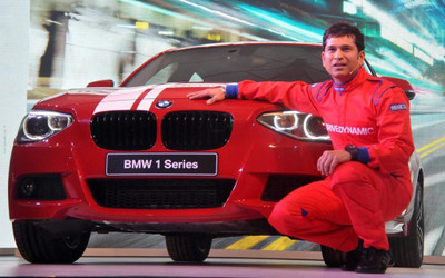 

Sachin Tendulkar with red car Poster Paper Print(12 inch X 18 inch, Rolled)