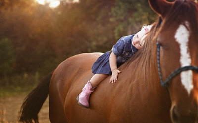 

Cute Baby sleeping on horse Poster Paper Print(12 inch X 18 inch, Rolled)