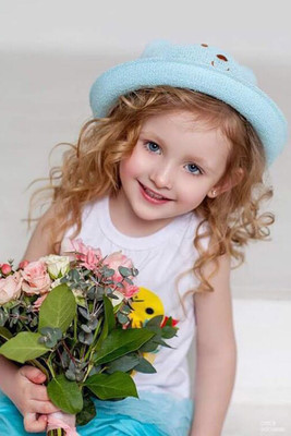 

Cute Baby Girl with flowers Poster Paper Print(12 inch X 18 inch, Rolled)