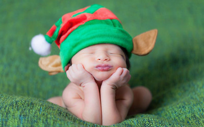 

Cute Baby in relaxed mood Poster Paper Print(12 inch X 18 inch, Rolled)