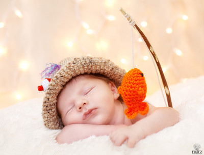 

Cute Baby Sleeping with toys Poster Paper Print(12 inch X 18 inch, Rolled)