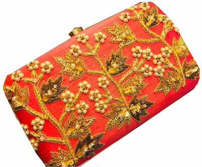 

Craftbazaar Party Orange Clutch
