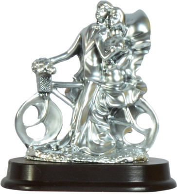 

Sigaram Love couple Statue Romantic Decorative Handicraft Figurine Home Interior Bedroom Décor. Decorative Showpiece - 12 cm(Polyresin, Multicolor)