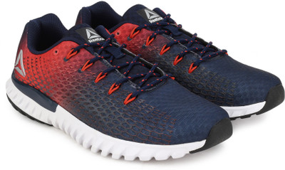 

REEBOK ELITE RUNNER Running Shoes For Men(Multicolor, Navy/carotene/sil/wht/blk