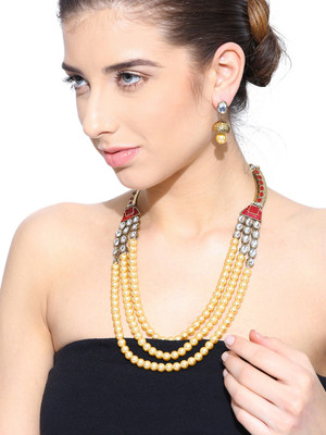 

Zaveri Pearls Zinc Jewel Set(Gold, Pink, Yellow)