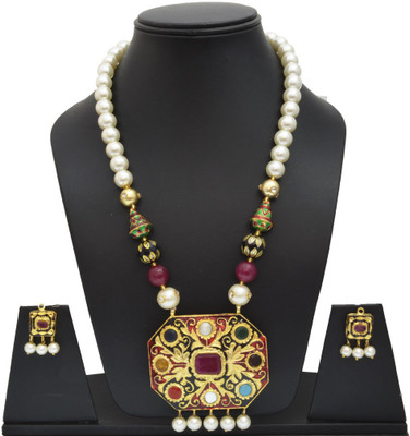 

Swarna Stone Jewel Set(Maroon, White, Gold)
