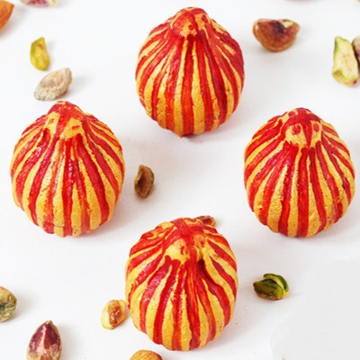 

Ghasitaram Gifts Golden Glittering Modaks(800 g, Box)