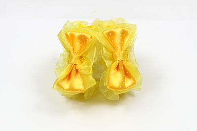 

Suhaavi Yellow Floral Baby Girls Rubber Band(Yellow)
