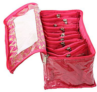 

Detak Red Fabric 10 Transparent Pouches Jewellery Box 10 Pouches for keeping your Jewellery safe and for best storage comes with one box It's a best option to use while travelling and it will help you to keep your heavy jewelary in a separate cover from o