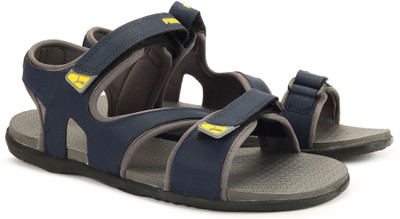 

Puma Men Peacoat-QUIET SHADE-Fizzy Yellow Sports Sandals