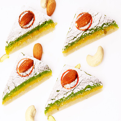 

Ghasitaram Gifts Sugar FreeKaju Kesar Pista Triangles(800 g, Box)