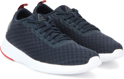 

REEBOK ASTRORIDE SOUL Walking Shoes For Men(Blue, Coll navy/primal red/wht