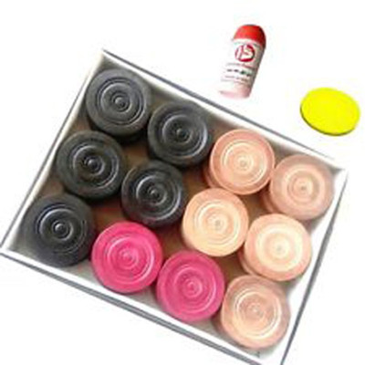 

Monika Sports carrom coins + striker + powder Board Game