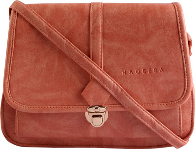 

Haqeeba Women Casual Orange Leatherette Sling Bag