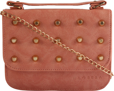 

Haqeeba Women Casual Pink Leatherette Sling Bag