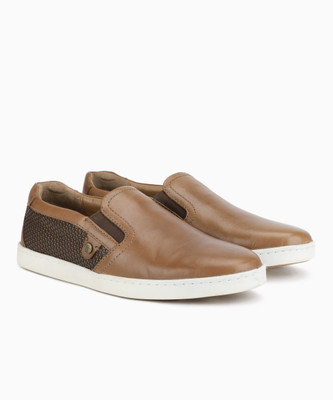 

Hush Puppies VENTURE SLIP ON Slip On Sneakers For Men(Brown, Black, Tan