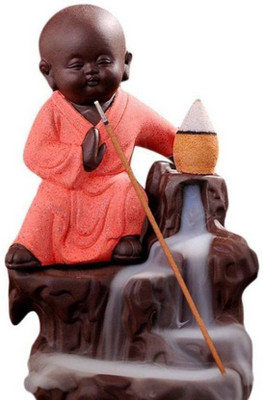 

AapnoCrafts Kung-Fu Style Monk Buddha Smoke Back flow Cone Incense Holder- With 10 Free Incence Cones Decorative Showpiece - 12 cm(Ceramic, Orange)