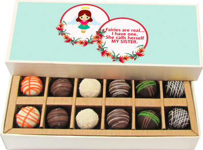 

Chocholik Rakshabandhan Gift Box - Fairies Are Real I Have One. She Calls Herself My Sister - Dark, Milk, White Chocolate Truffles - 12pc Truffles(180 g)